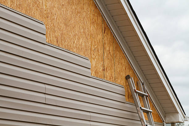 Professional Emergency Siding Repair technician working in Hugo, MN